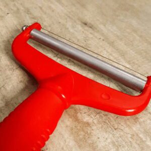 Corta Queso Practico .